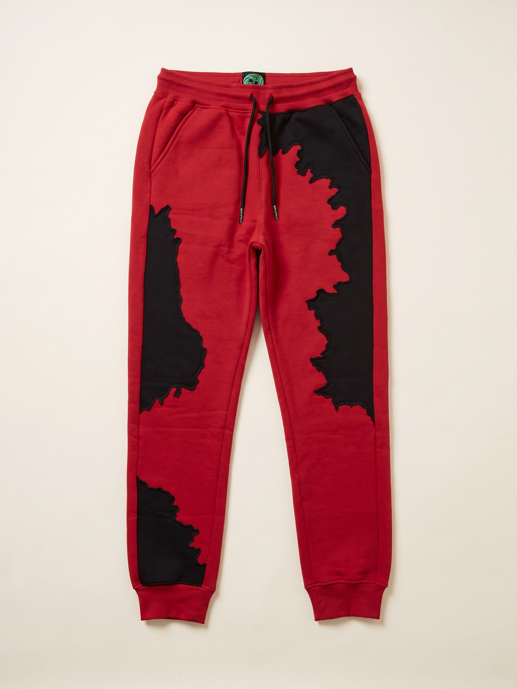 Spill Joggers – Red – flat lay, front