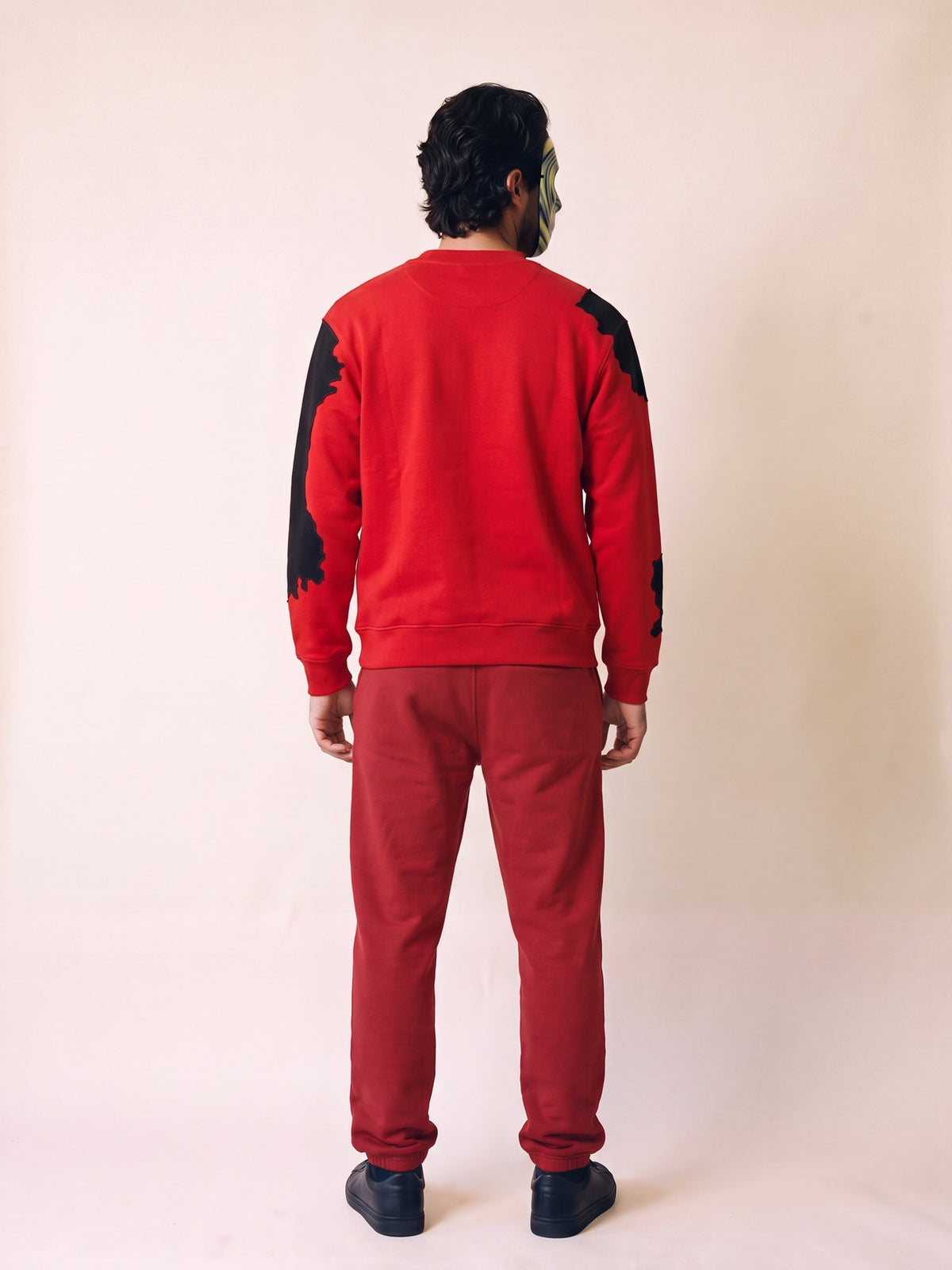 Spill Sweatshirt – Red – on model, back
