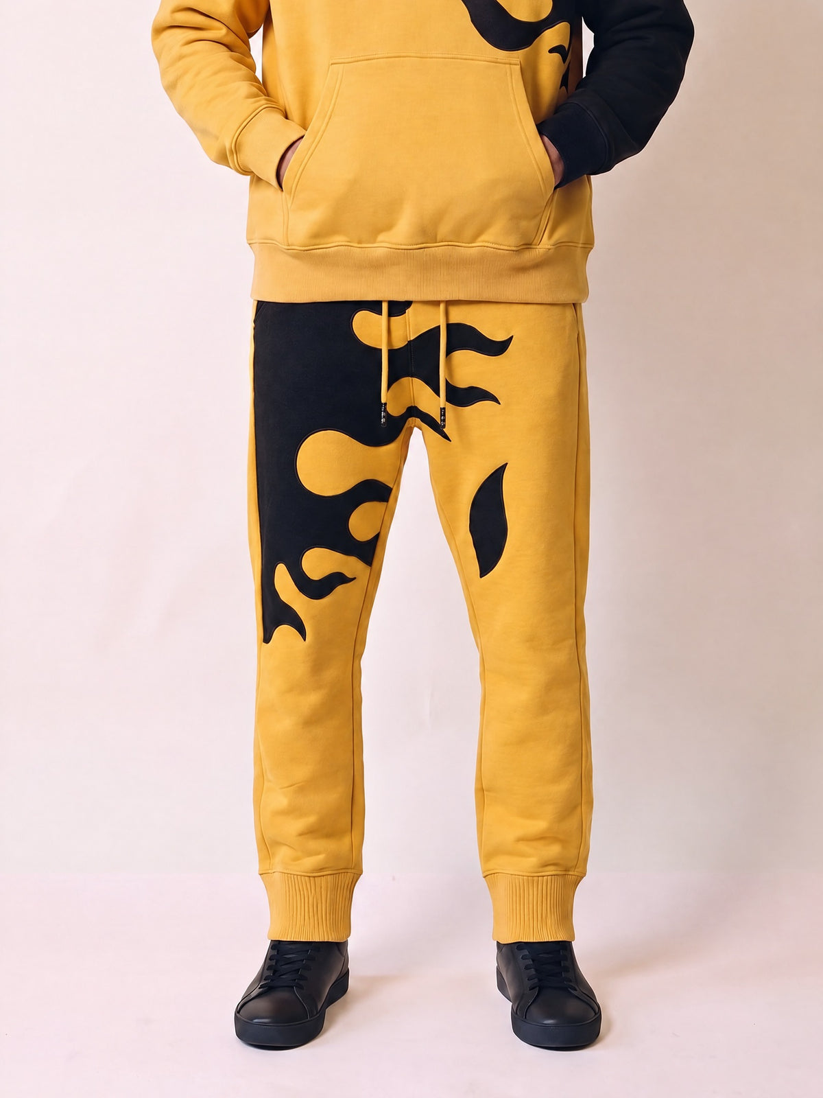 Flame Joggers II – Yellow – on model, front