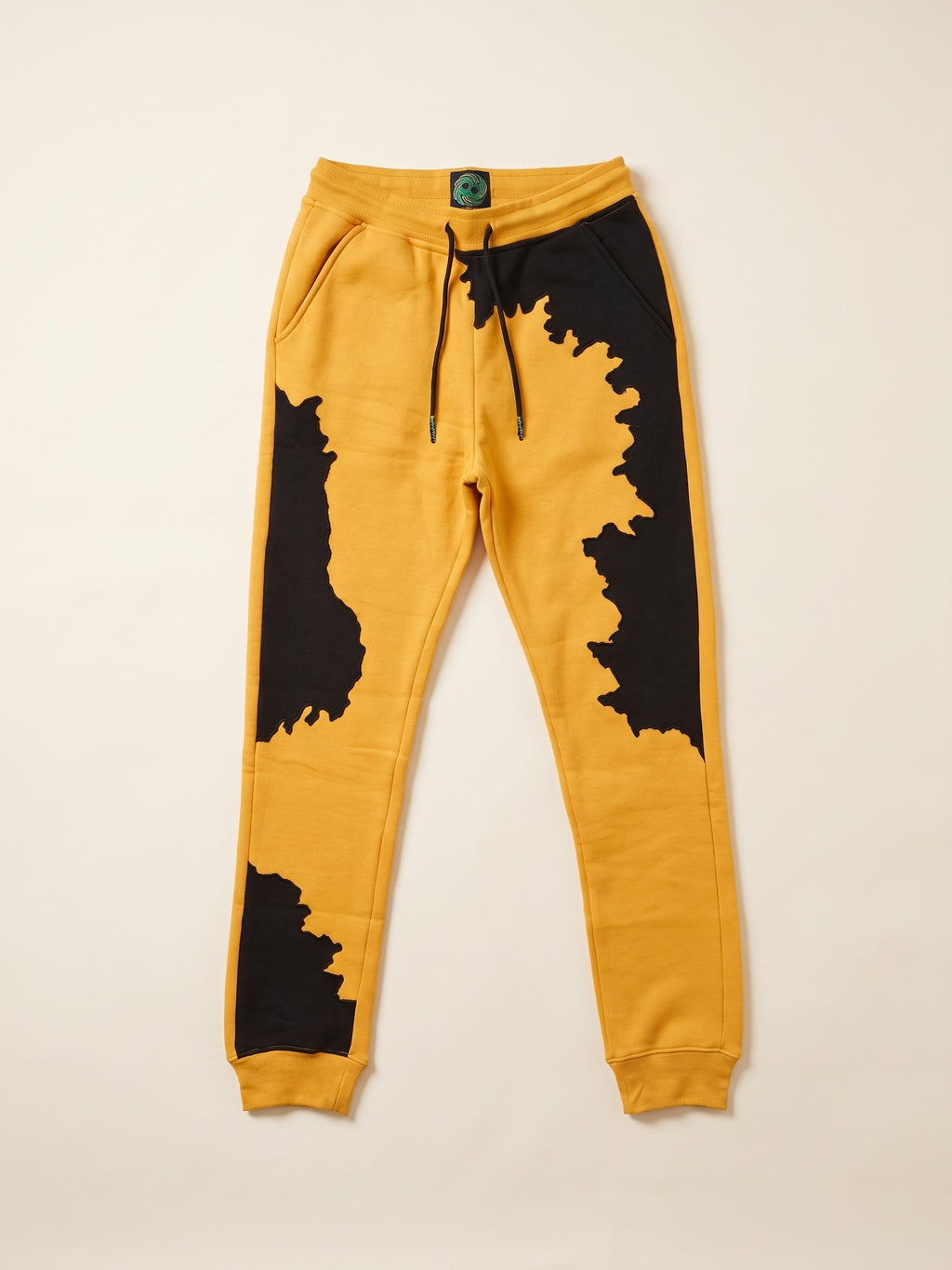 Spill Joggers – Yellow – flat lay, front