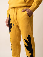 Flame Joggers – Yellow – side pocket on model