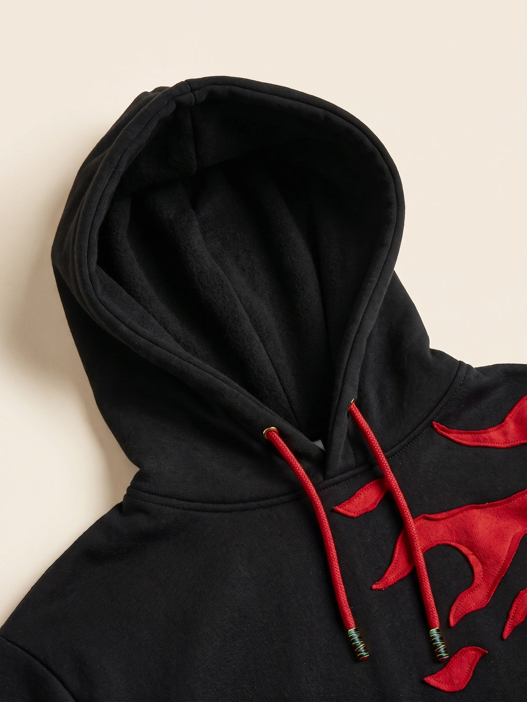 Flame Hoodie – Black – hood and drawcords close-up