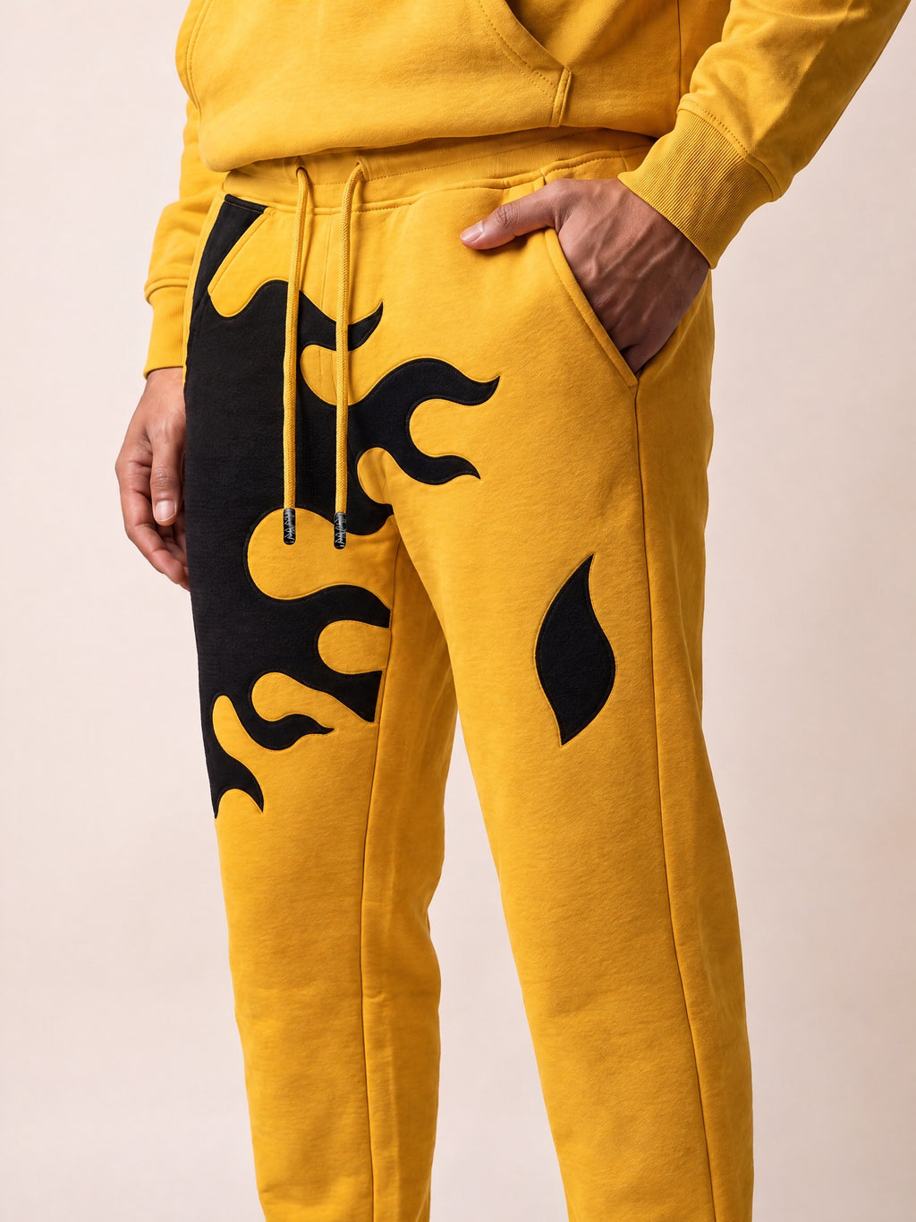 Flame Joggers II – Yellow – side pocket on model
