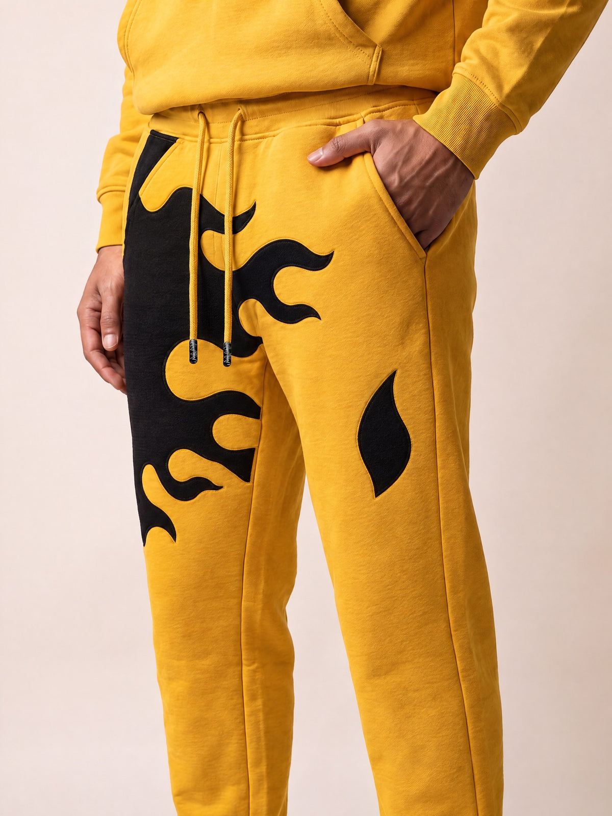 Flame Joggers II – Yellow – side pocket on model